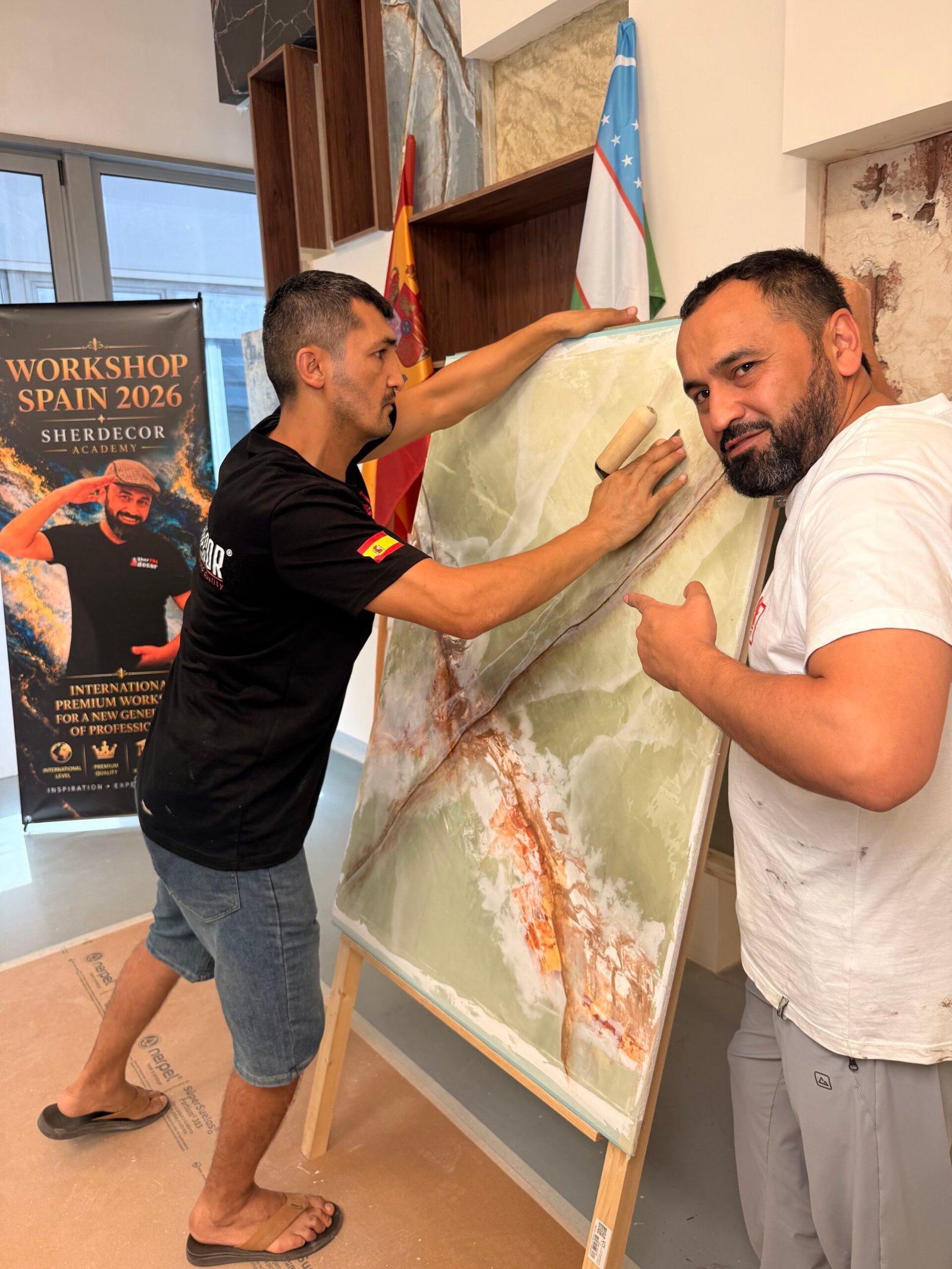 Sherzod Rakhimov providing hands-on decorative art mentorship